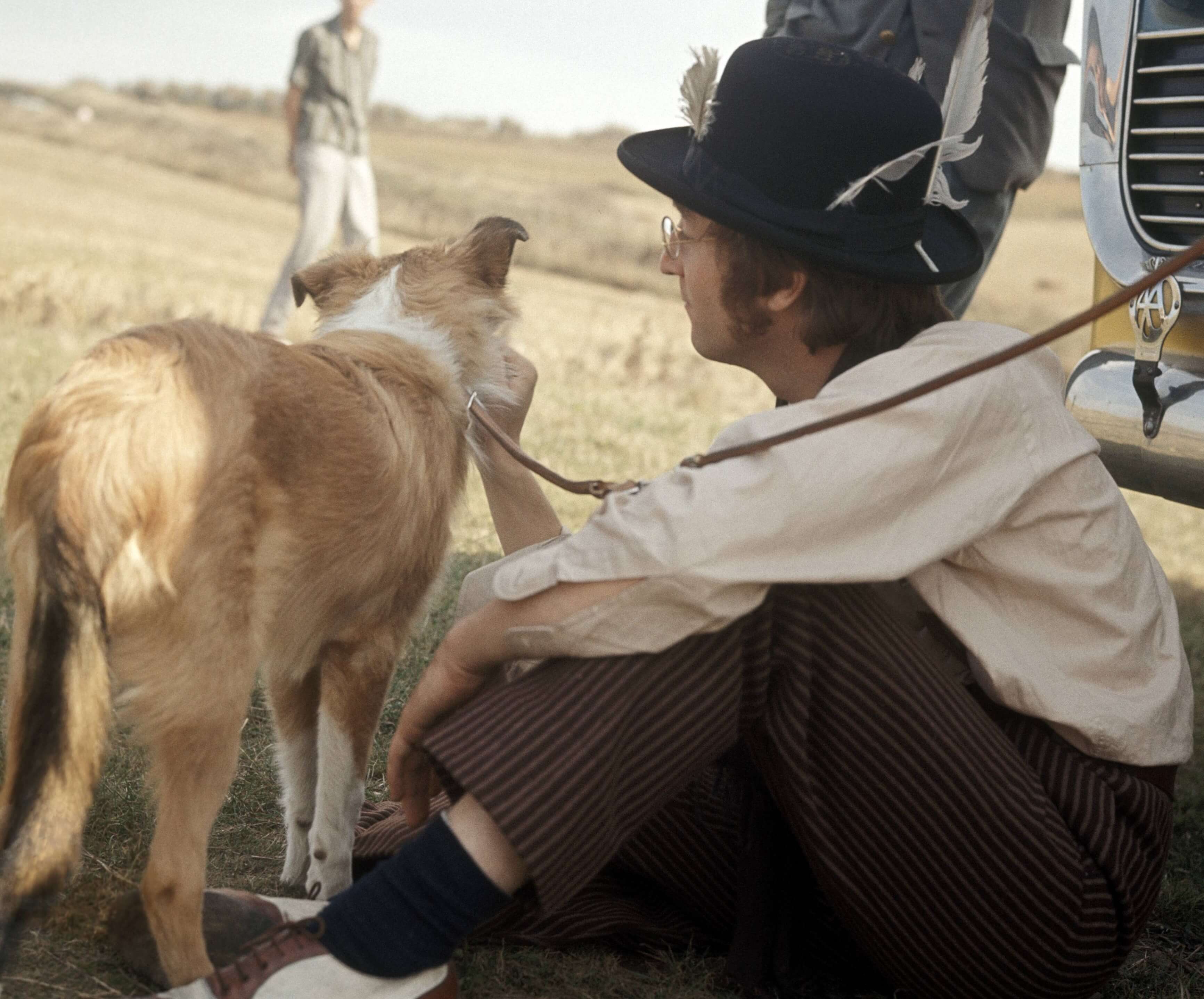 John Lennon with a dog