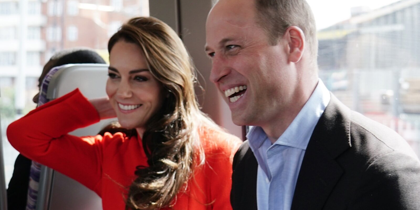 Kate Middleton and Prince William smile for the cameras while visiting the the Dog & Duck pub in London.