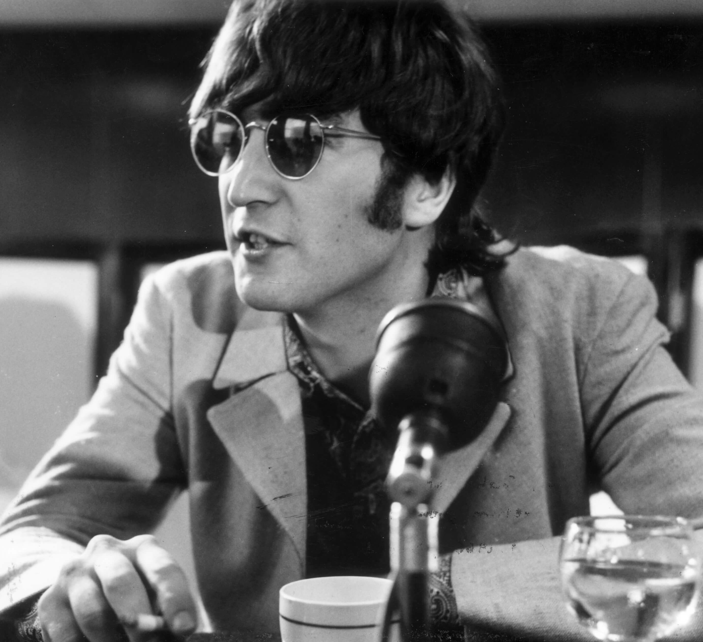 John Lennon wearing glasses