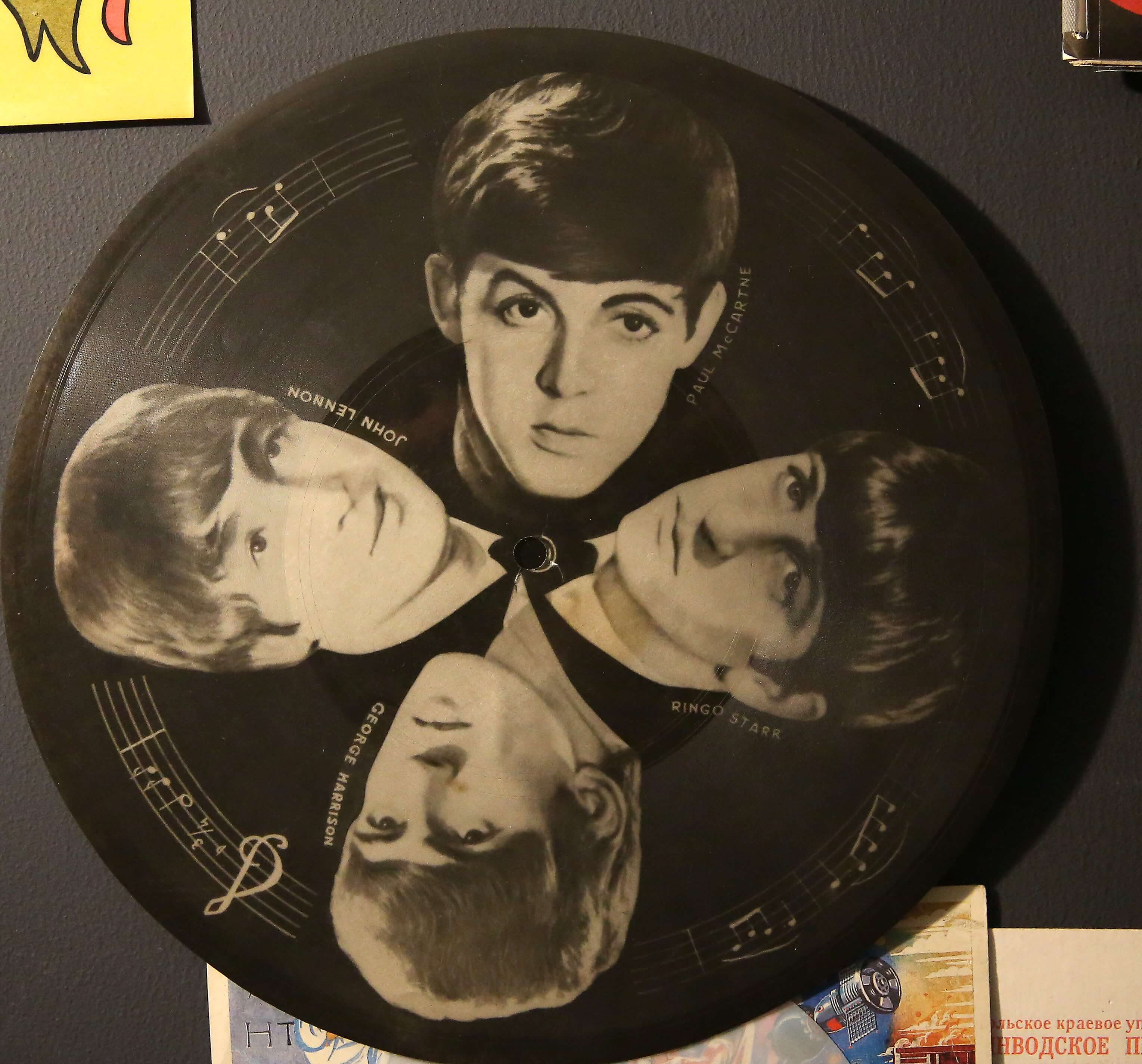 A vinyl with black-and-white images of The Beatles from the "Hey Jude" era