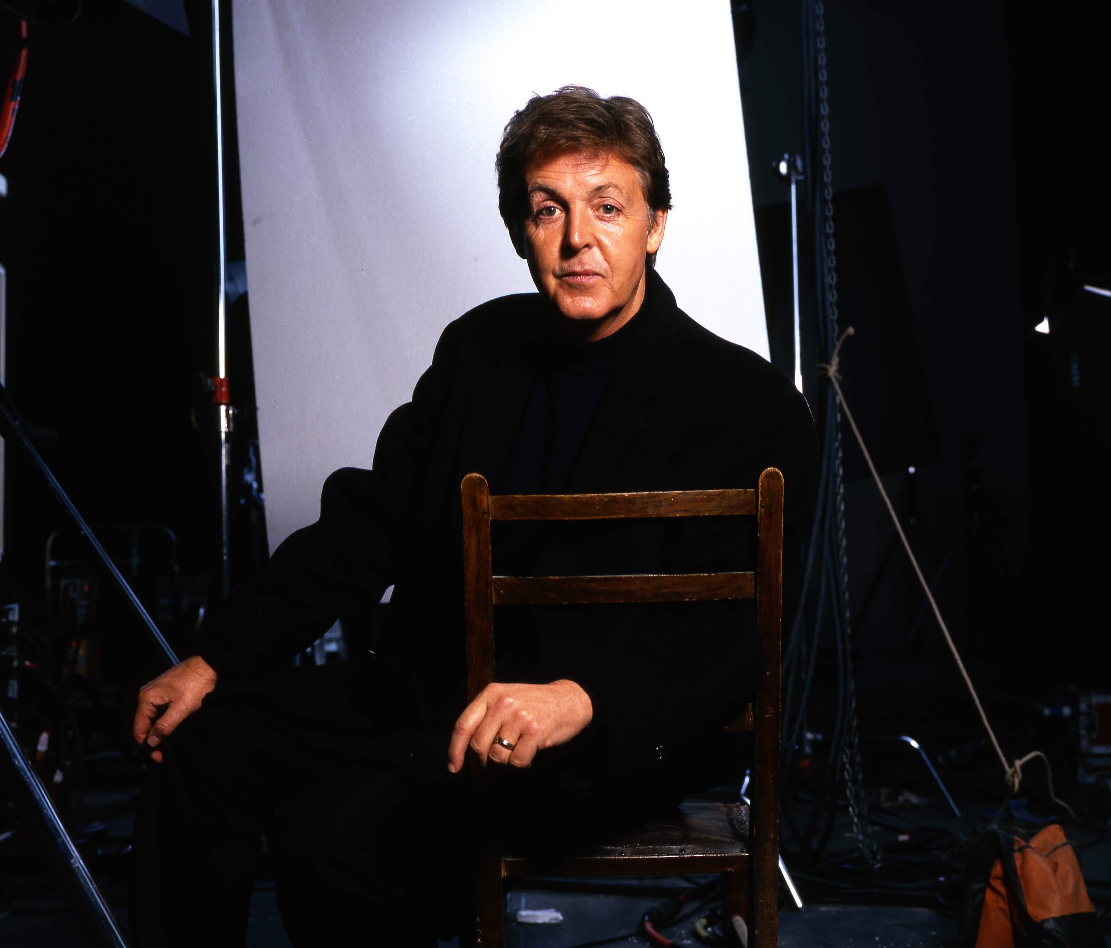 Paul McCartney dressed in black