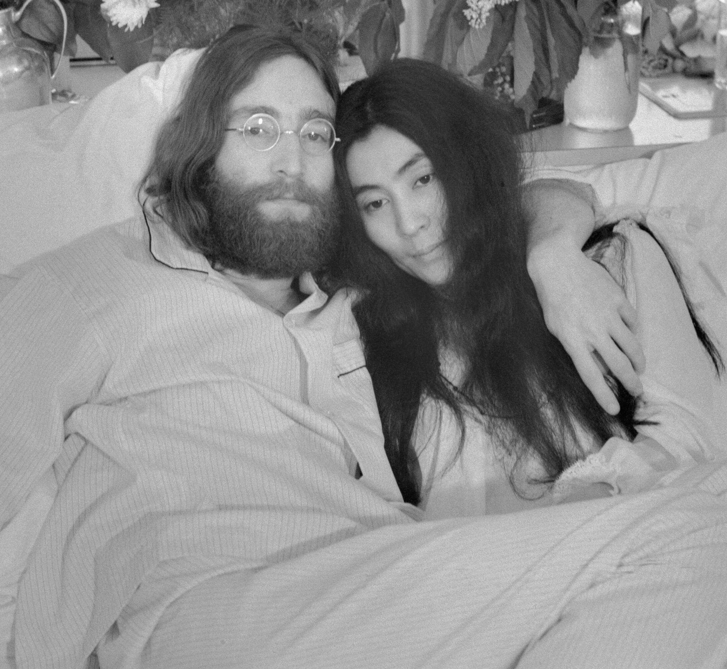 John Lennon and Yoko Ono in pajamas during The Beatles' "Revolution 9" era