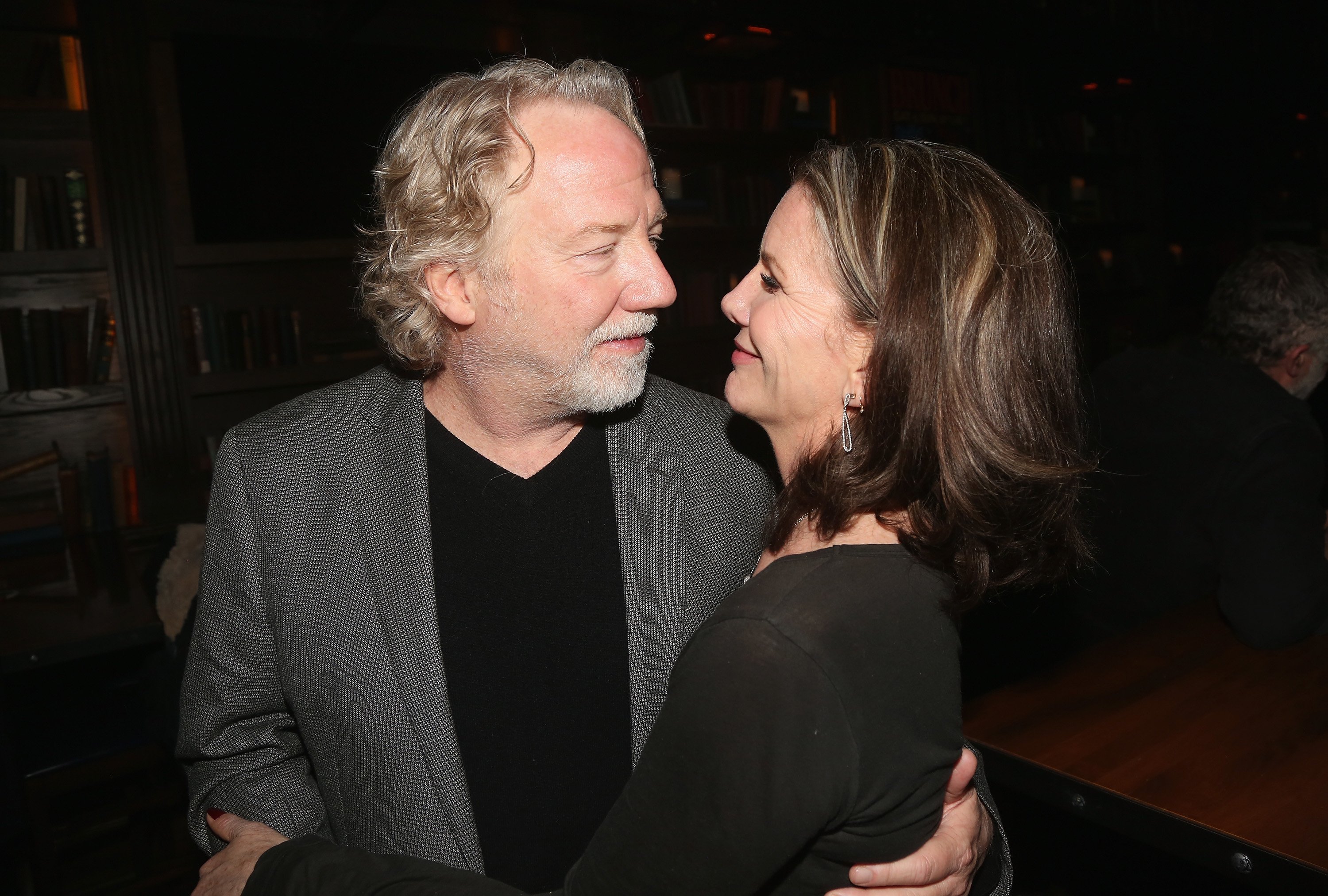 Timothy Busfield and Melissa Gilbert, who bought a house in the Catskills in 2019, look at each other lovingly.