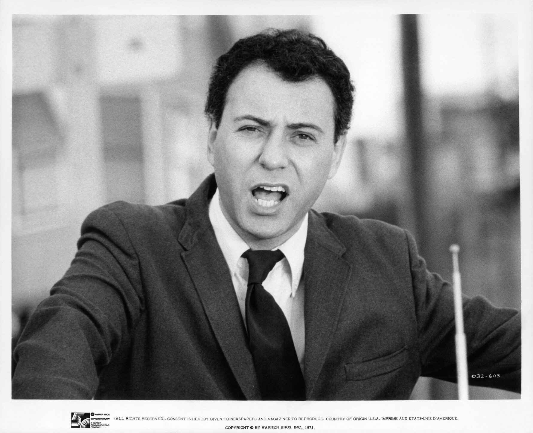 A black and white phoot of actor Alan Arkin