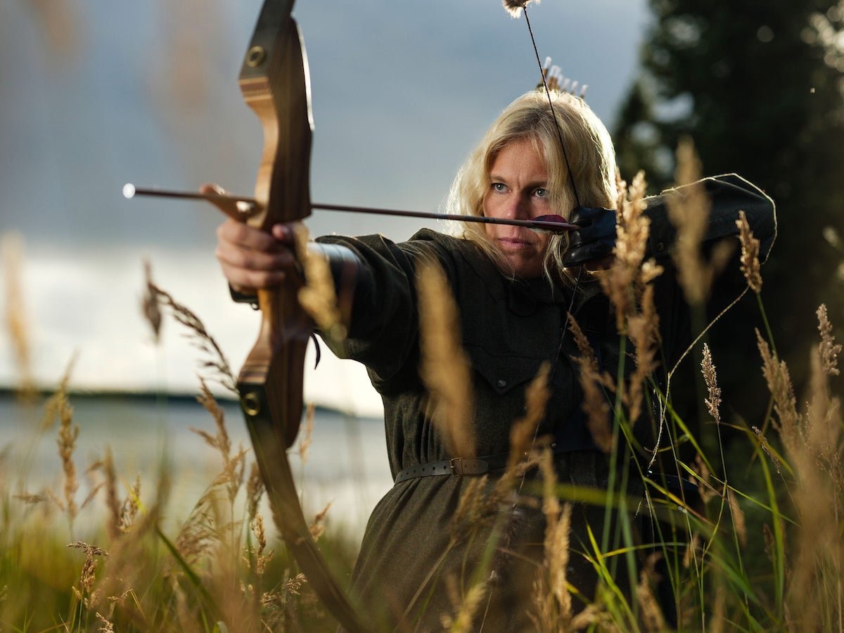'Alone' Season 10 cast member Jodi Rose with a bow and arrow