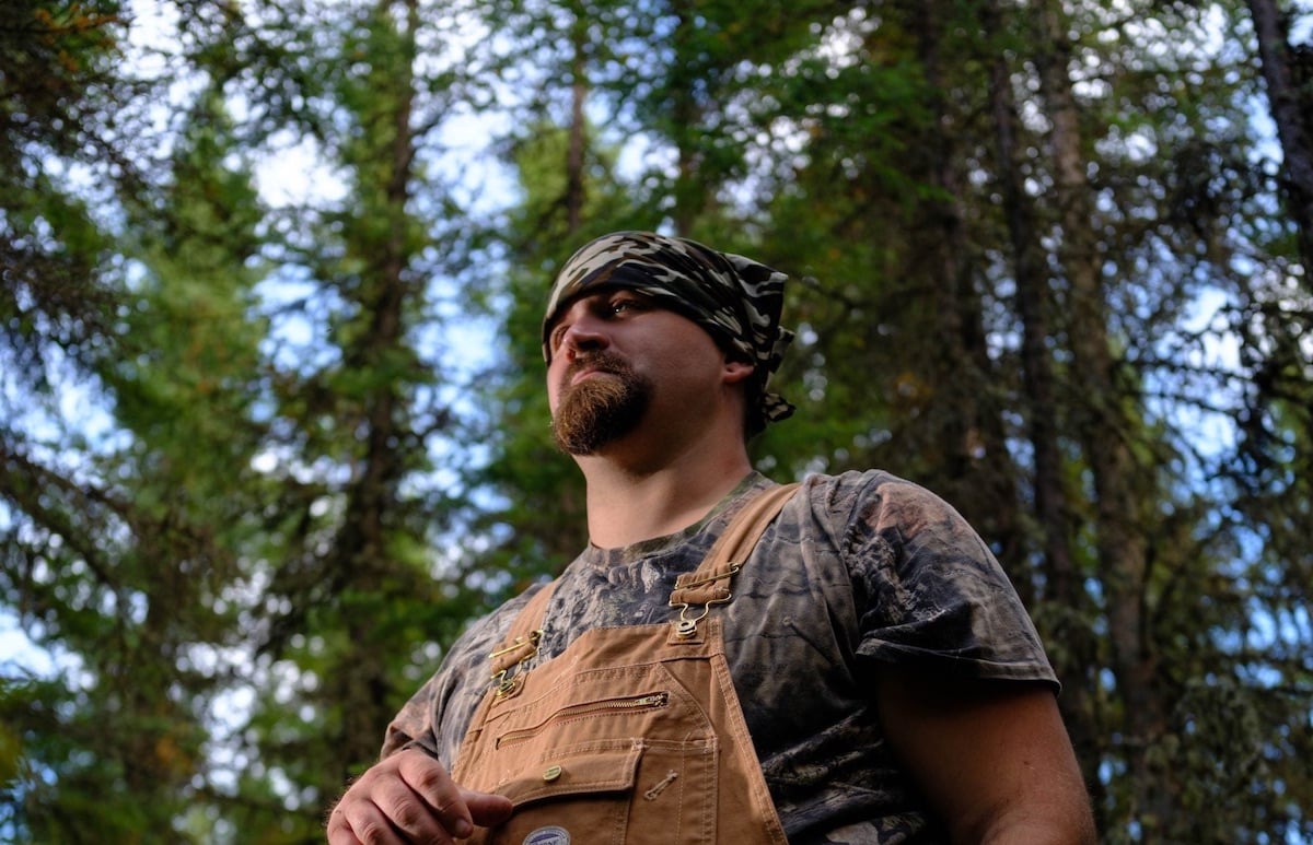 Mikey Helton from 'Alone' Season 10 wearing a bandana and overalls