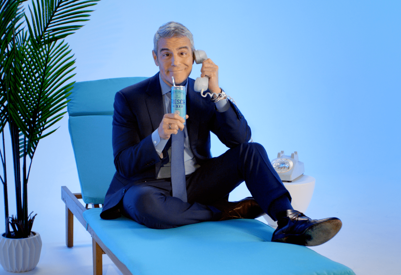 Andy Cohen holds a can of Fresca Mixed