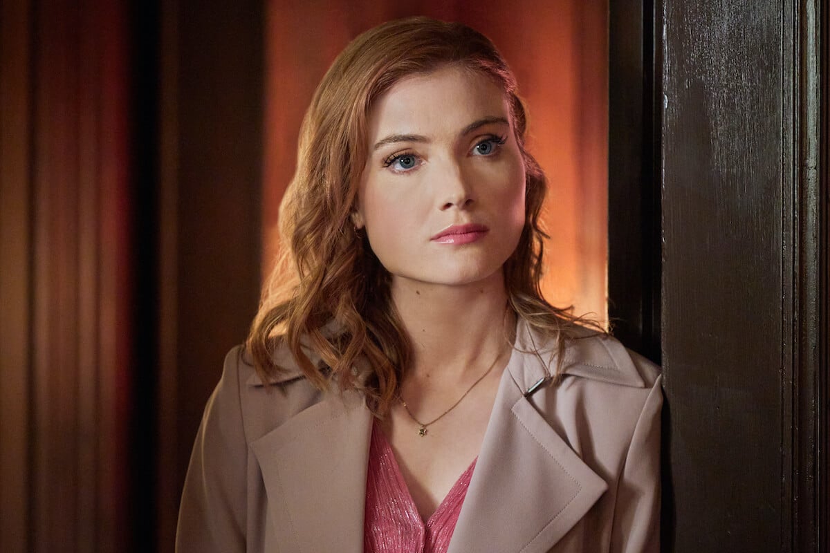 Skyler Samuels wearing a beige jacket in 'Aurora Teagarden Mysteries: Something New'