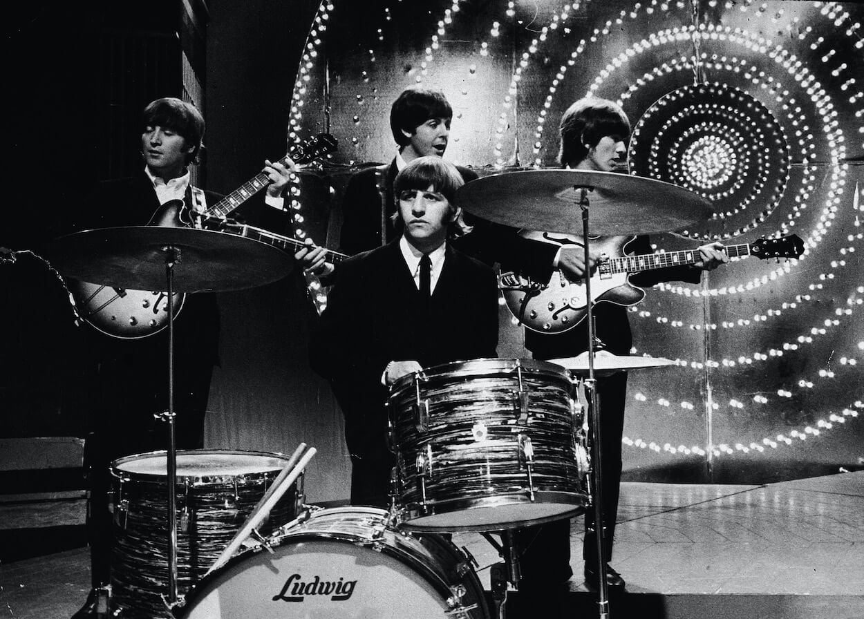 Beatles members (from left) John Lennon, Ringo Starr, Paul McCartney, and George Harrison performing on British TV in 1966.
