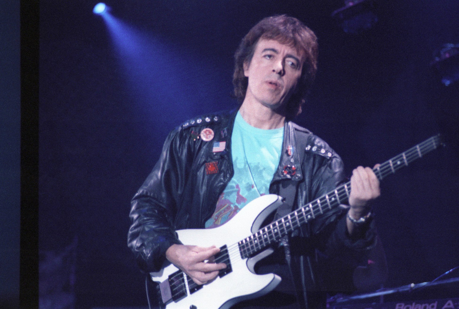 Bill Wyman performs with The Rolling Stones in Minneapolis, Minnesota in 1989