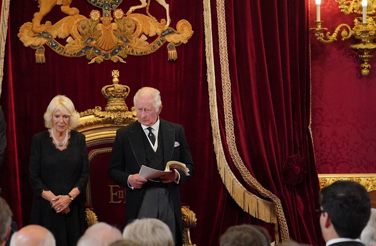 Camilla Parker Bowles looks on as King Charles III, who a body language expert says get 'stressed' when his wife isn't in his eyeline, attends his proclamation as monarch during the accession council
