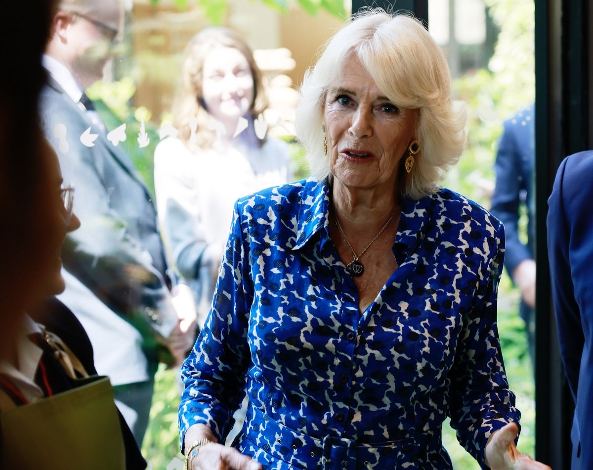 Camilla Parker Bowles, who a body language expert says had a ‘chaotic’ greeting with her friends, visits the Garden Museum in London