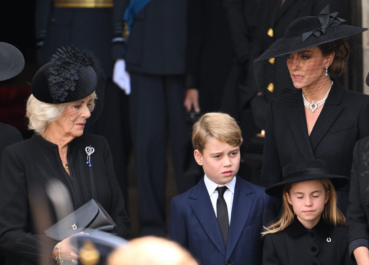 Camilla Parker Bowles, who a body language expert said scolding or telling off Princess Charlotte would have been controversial, at queen's funeral with Prince George and Kate Middleton as well
