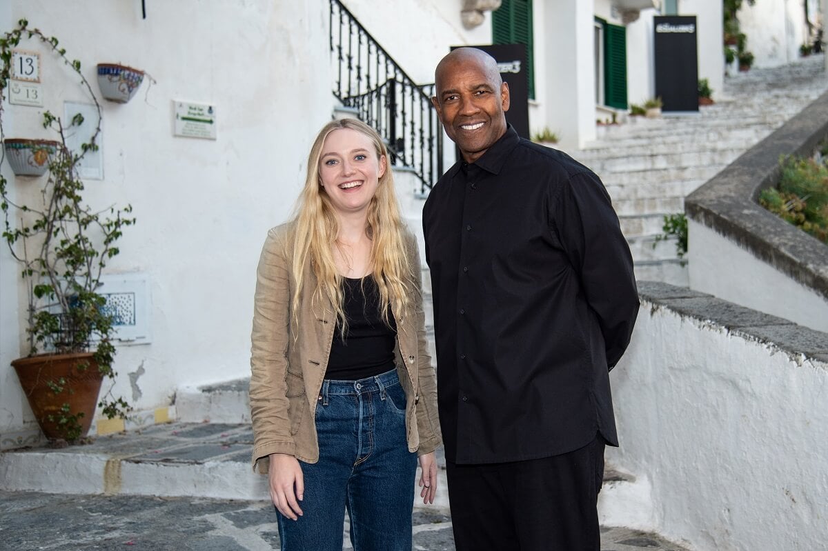 Denzel Washington and Dakota Fanning posing for 'The Equalizer 3' photocall.