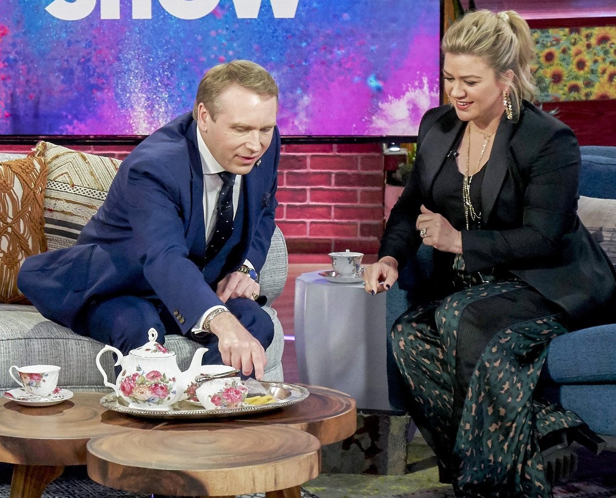 Grant Harrold demonstrating tea etiquette on Kelly Clarkson's talk show