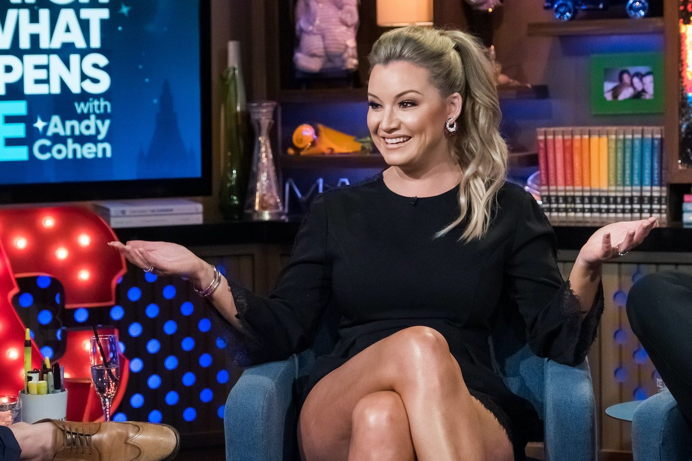 Hannah Ferrier appeared on 'WWHL' and holds up her arms