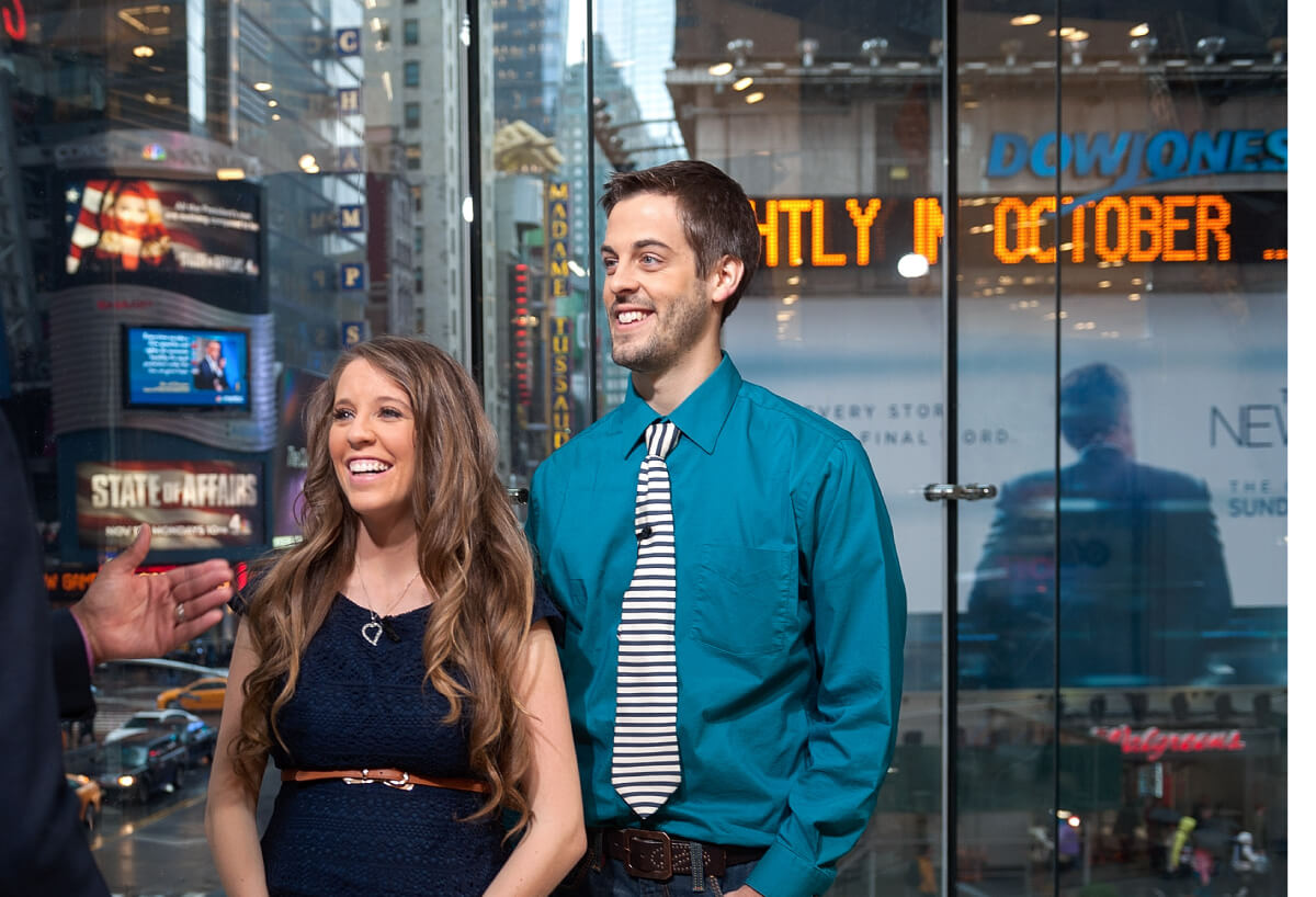Jill Duggar Dillard and husband Derick Dillard during their visit to "Extra" at their New York studios at H&M in Times Square on October 23, 2014 in New York City