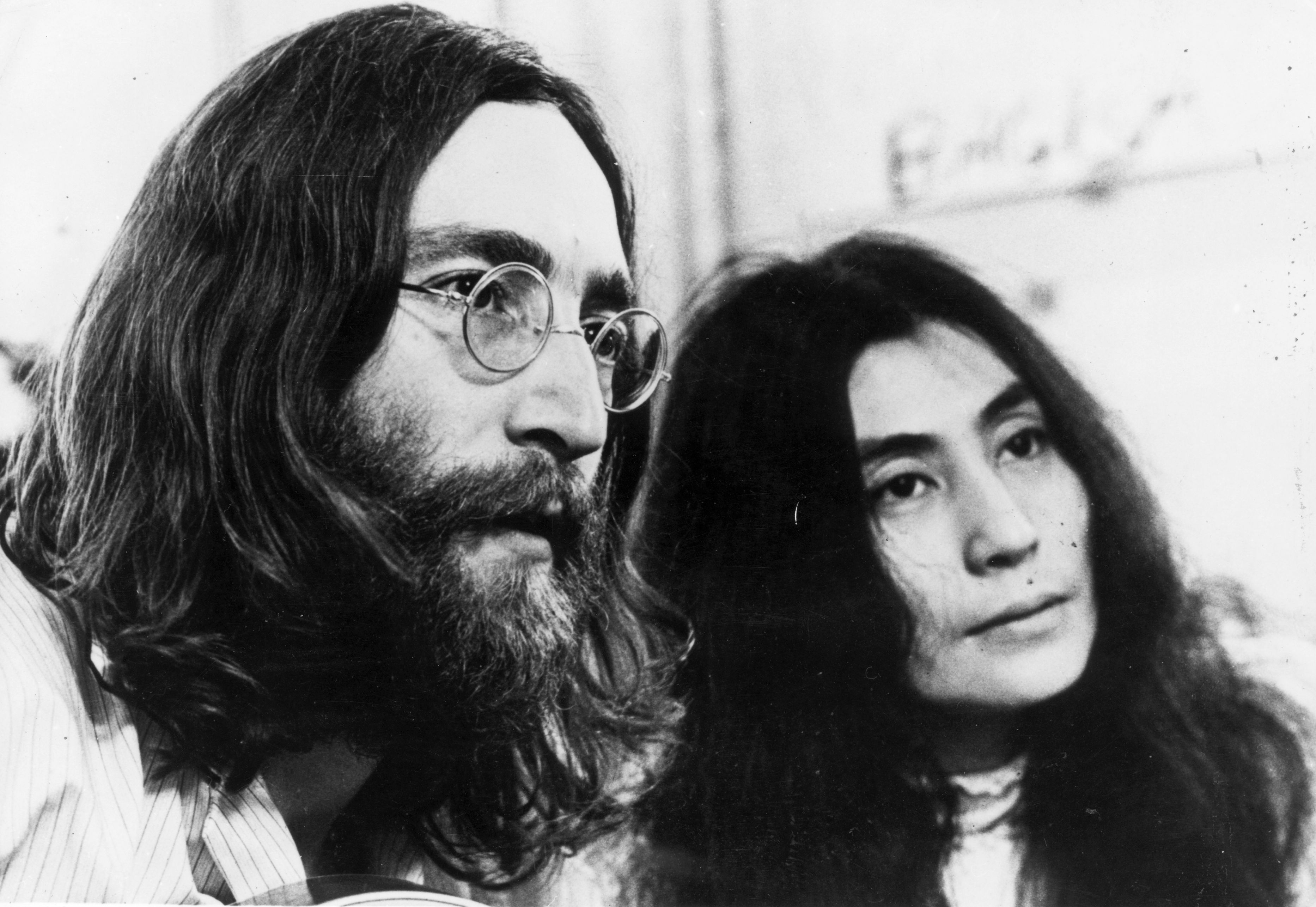 John Lennon and Yoko Ono listening to playback of their tapes
