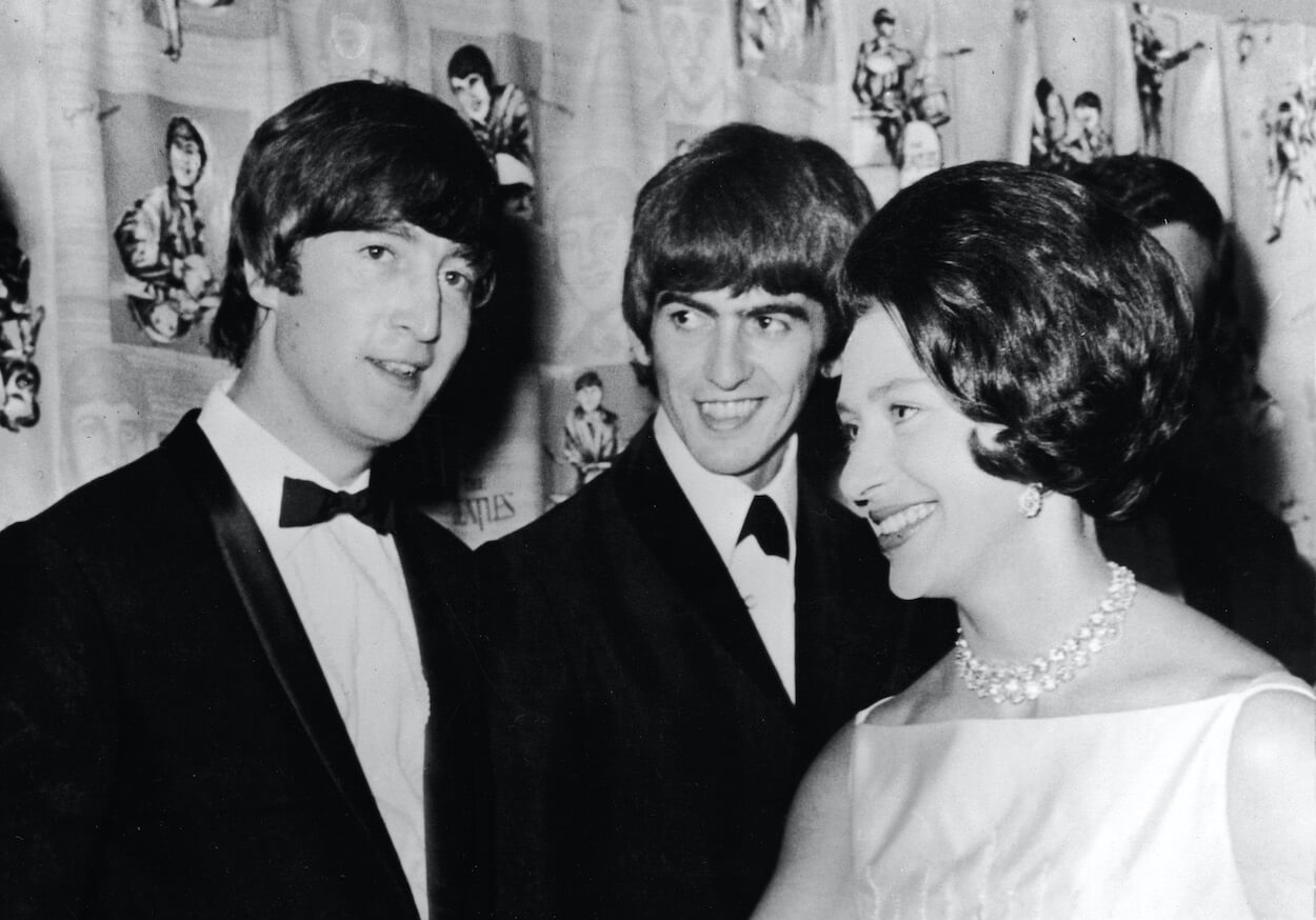 Beatles members John Lennon (left) and George Harrison meet Princess Margaret at the 'A Hard Day's Night' movie premiere in July 1964.