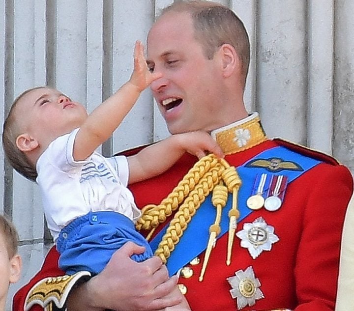 Kate Middleton and Prince William on the Buckingham Palace balcony with their children Prince George, Princess Charlotte, and Prince Louis, who the are hoping behave