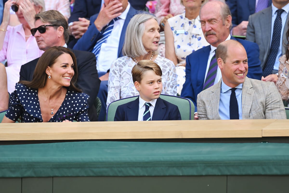 Kate Middleton and Prince William, whose parenting may change when Prince Charles becomes a teenager, sit next to their oldest son at Wimbledon