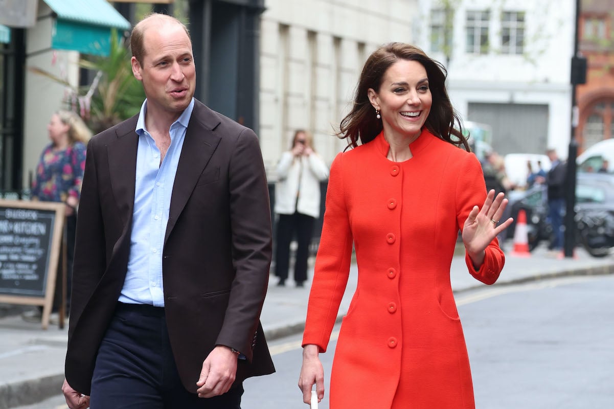 Prince William and Kate Middleton wave to crowds during their visit to Wales in 2023