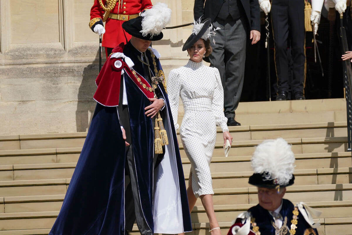 Kate Middleton, whose 2023 Order of the Garter polka dot dress has been dubbed 'redundant,' walks with Prince William behind King Charles III