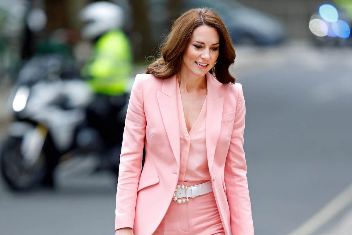 Kate Middleton, whose clothes went from 'businesslike' to 'feminine,' looks on