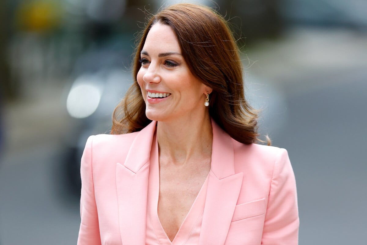 Kate Middleton, whose parenting style includes 1 'important' word, smiles and looks on