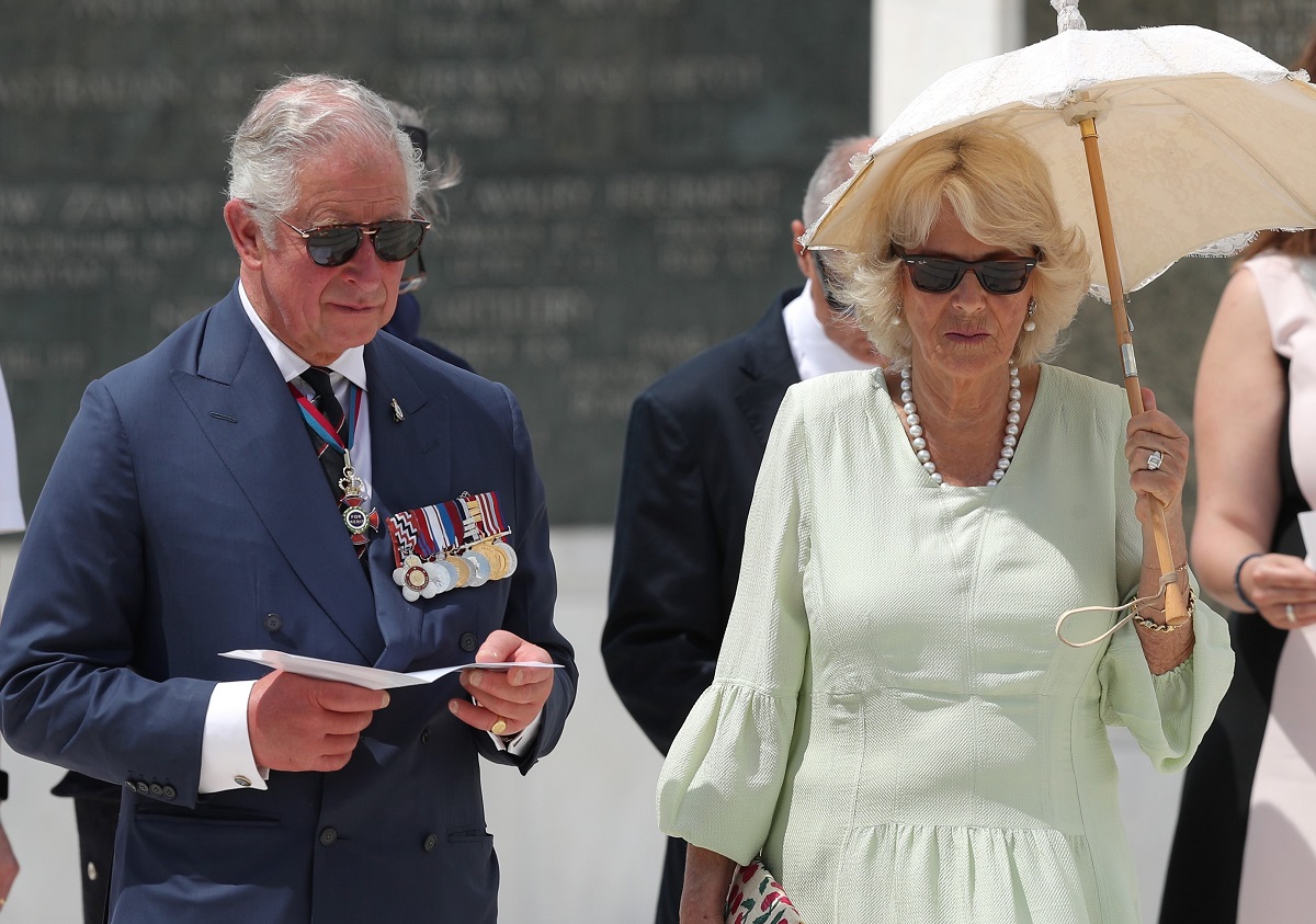 King Charles III and Camilla Parker Bowles, who a body language expert says looked 'frustrated' and 'tetchy' after a trip to Greece, visit the Commonwealth war graves in Athens