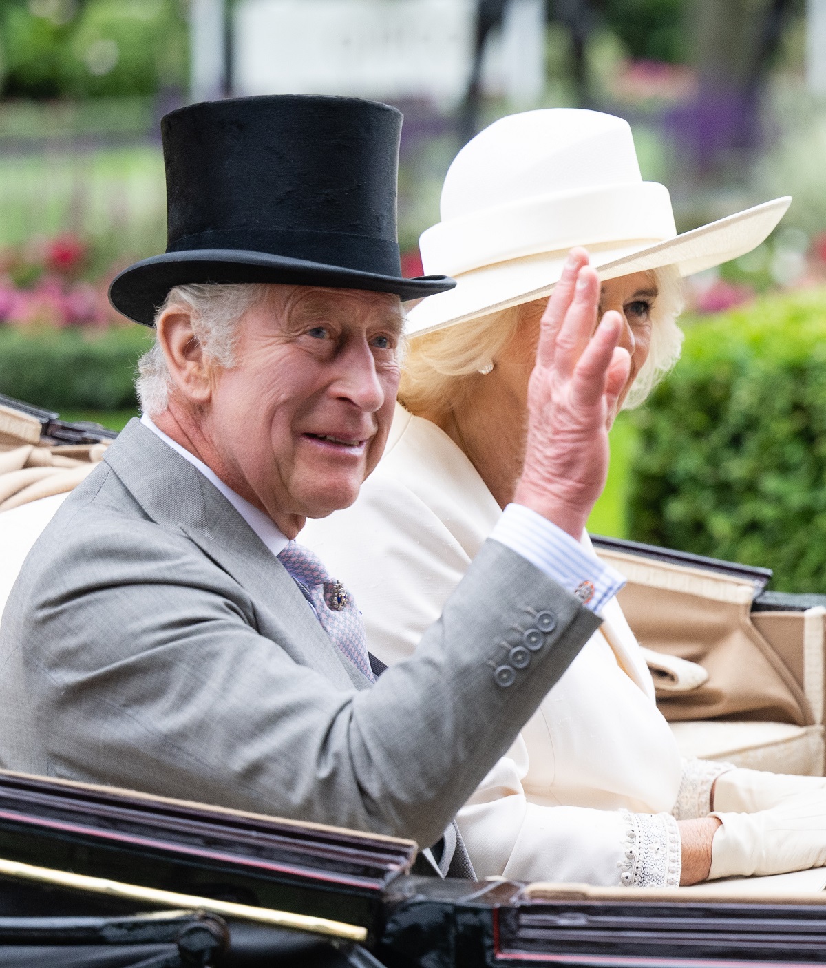 King Charles III and Queen Camilla arrive by carriage as they attends day one of Royal Ascot 2023