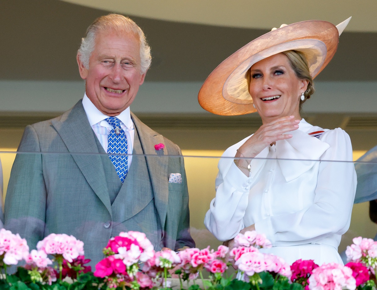 King Charles III and Sophie, Duchess of Edinburgh watch his horse 'Circle of Fire' run in 'The Queen's Vase' on day 2 of Royal Ascot 2023