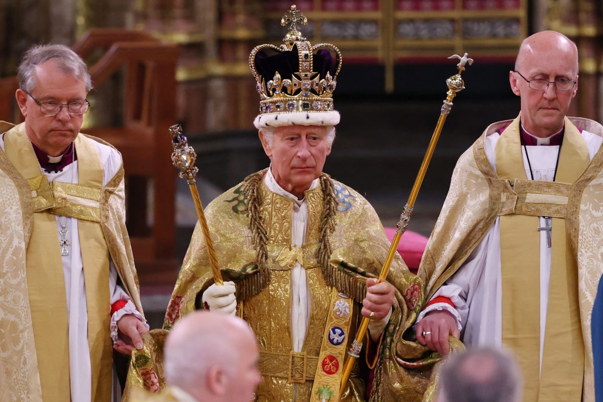 King Charles III, who uttered an eight-word fear about his coronation, stands after being crowned during the ceremony in Westminster Abbey