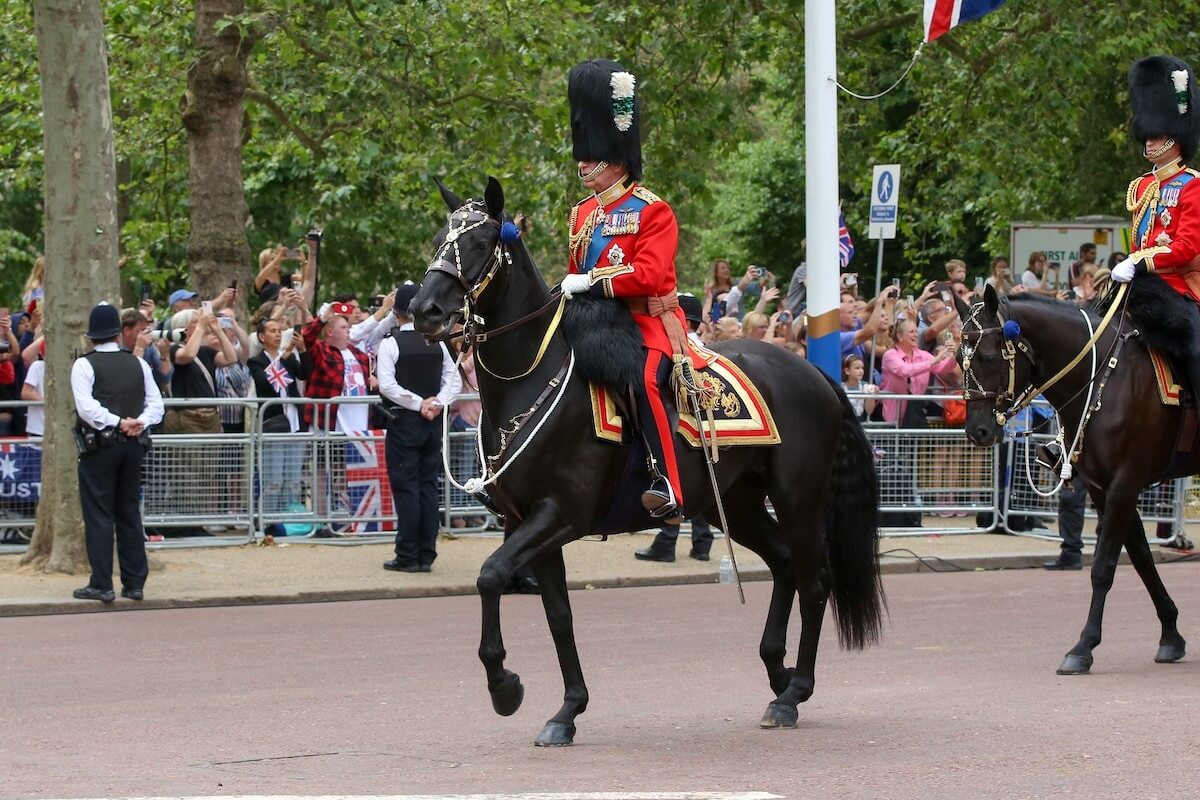 King Charles III, whom Queen Camilla gave a 'pep talk' to during Trooping the Colour, rides a horse