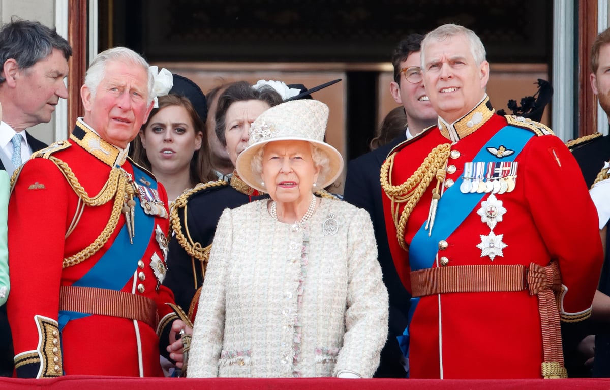 King Charles, then Prince Charles, Prince of Wales, Queen Elizabeth II and Prince Andrew, Duke of York watch a flypast from the balcony of Buckingham Palace during Trooping The Colour, the Queen's annual birthday parade, on June 8, 2019 in London, England