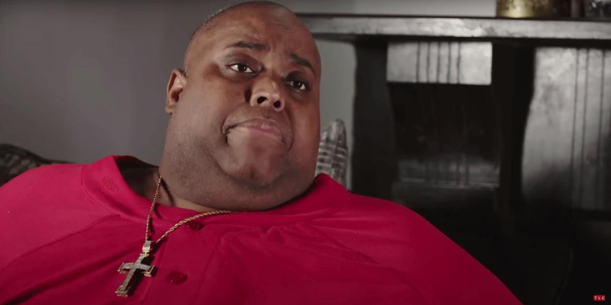 Larry Myers Jr in a red shirt in an episode of 'My 600-lb Life' on TLC