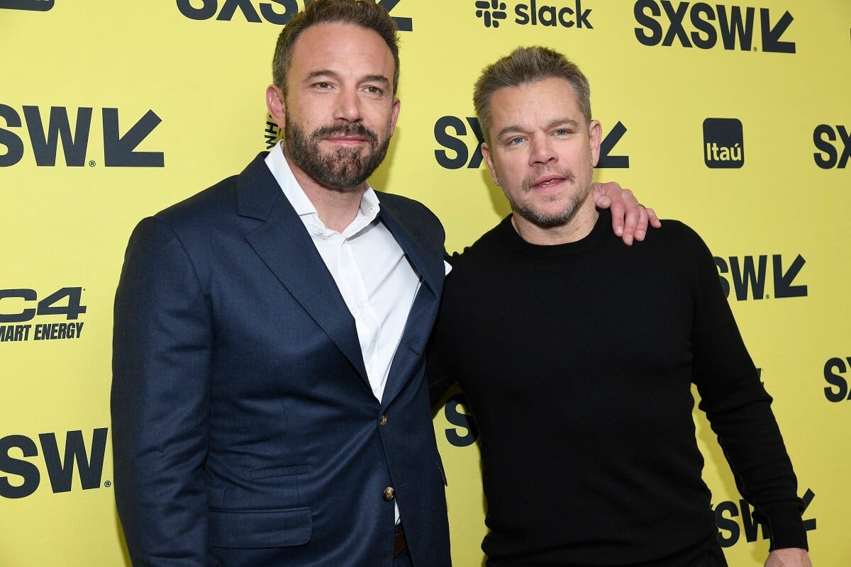 Matt Damon and Ben Affleck smiling at the premiere of "Air".
