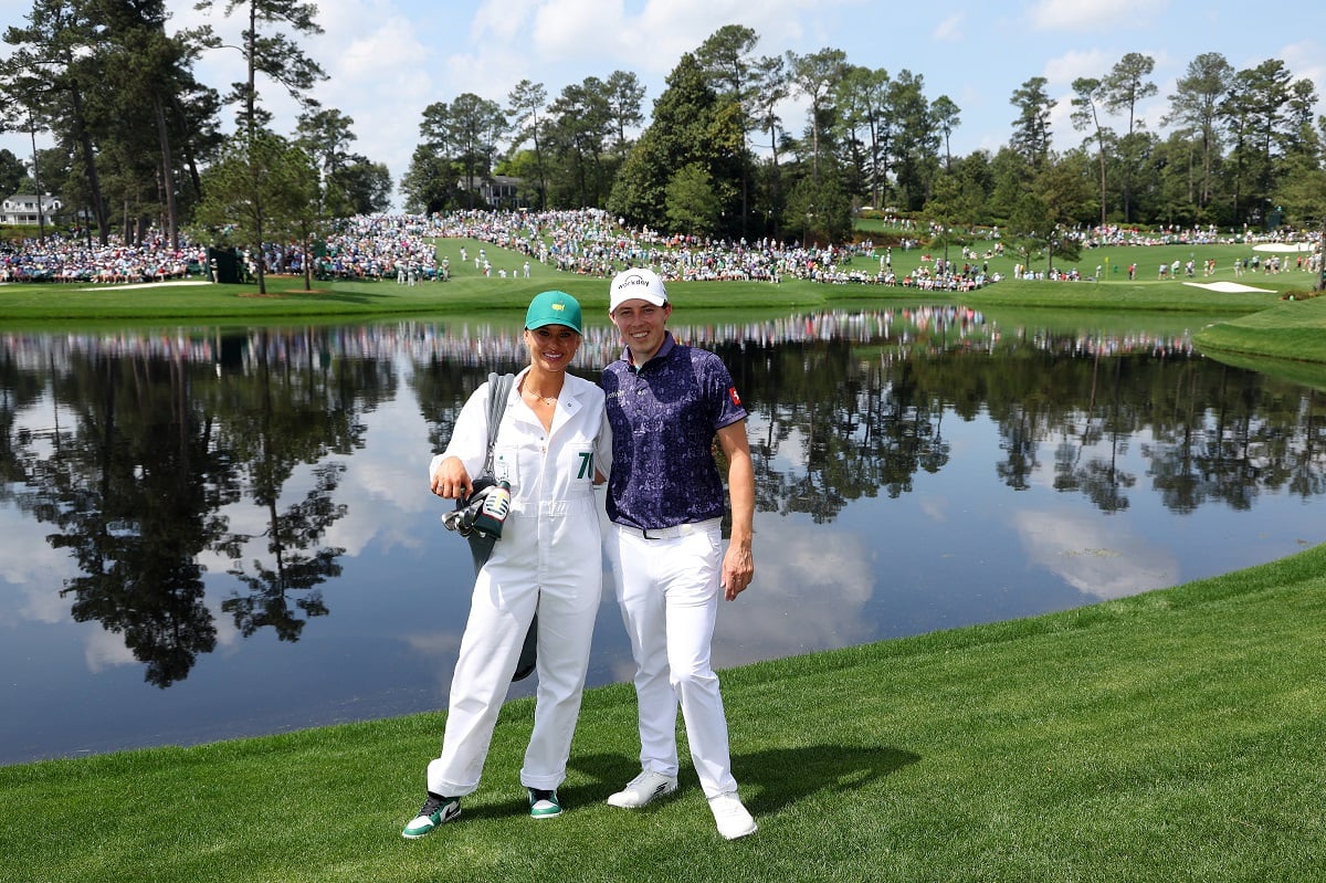 Matt Fitzpatrick poses with girlfriend Katherine Gaal during the Par 3 contest prior to the 2023 Masters Tournament