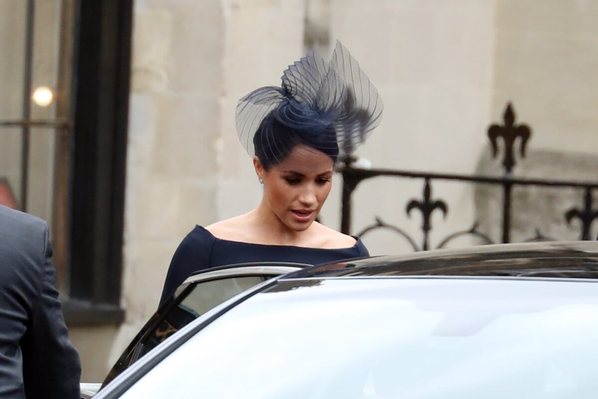 Meghan Markle, who may want to consider a couture partnership, according to an expert, wears Christian Dior
