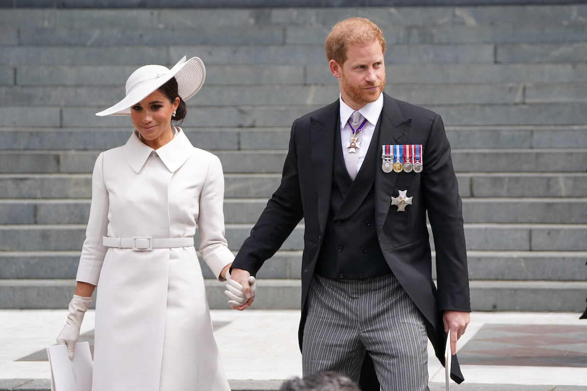 Meghan Markle, whom an expert says would be 'clever' to become a brand ambassador for couture, wears Dior and holds hands with Prince Harry