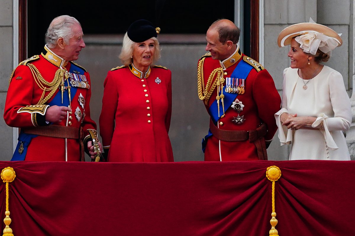 Members of the royal family, who a biographer says are 'discreetly laughing' at Prince Harry and Meghan Markle, standing on the balcony of Buckingham Palace following the Trooping the Colour