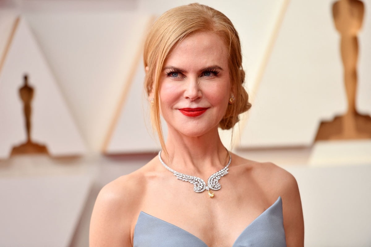 Nicole Kidman posing in a dress at the Oscars.