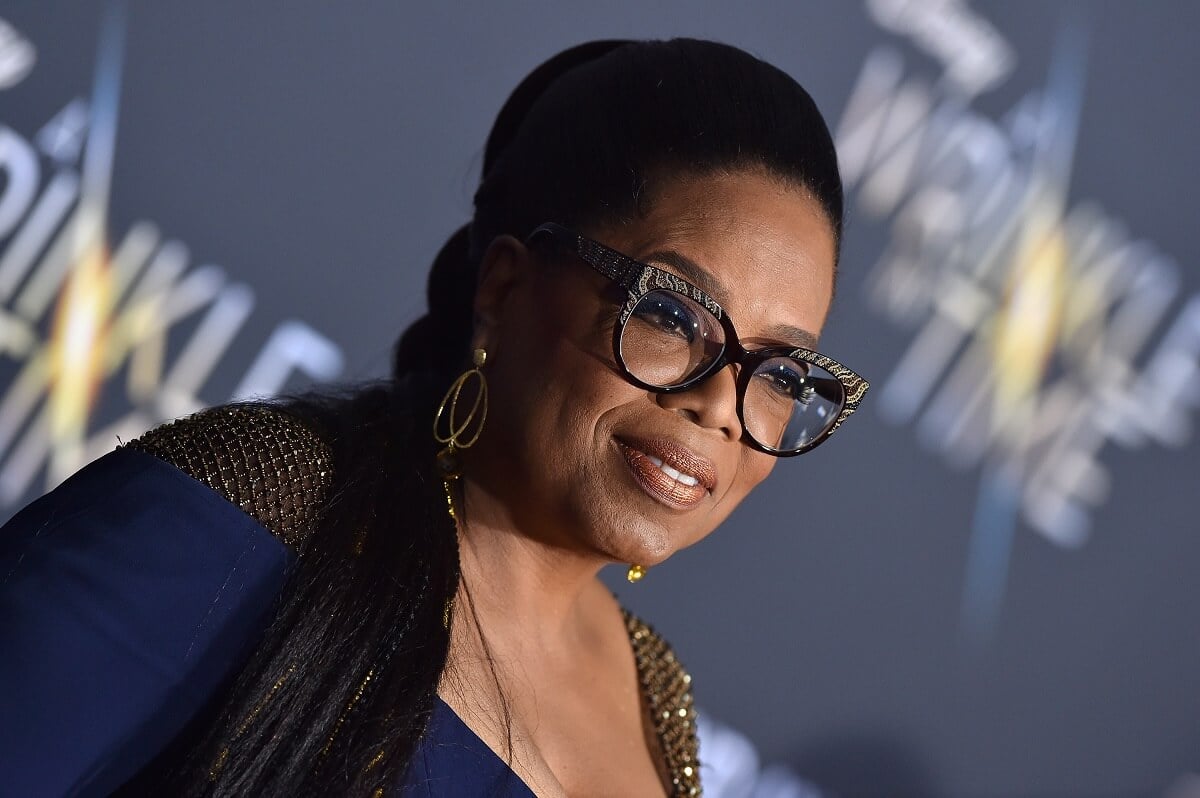 Oprah Winfrey smiling and posing at the Disney's 'A Wrinkle In Time'.