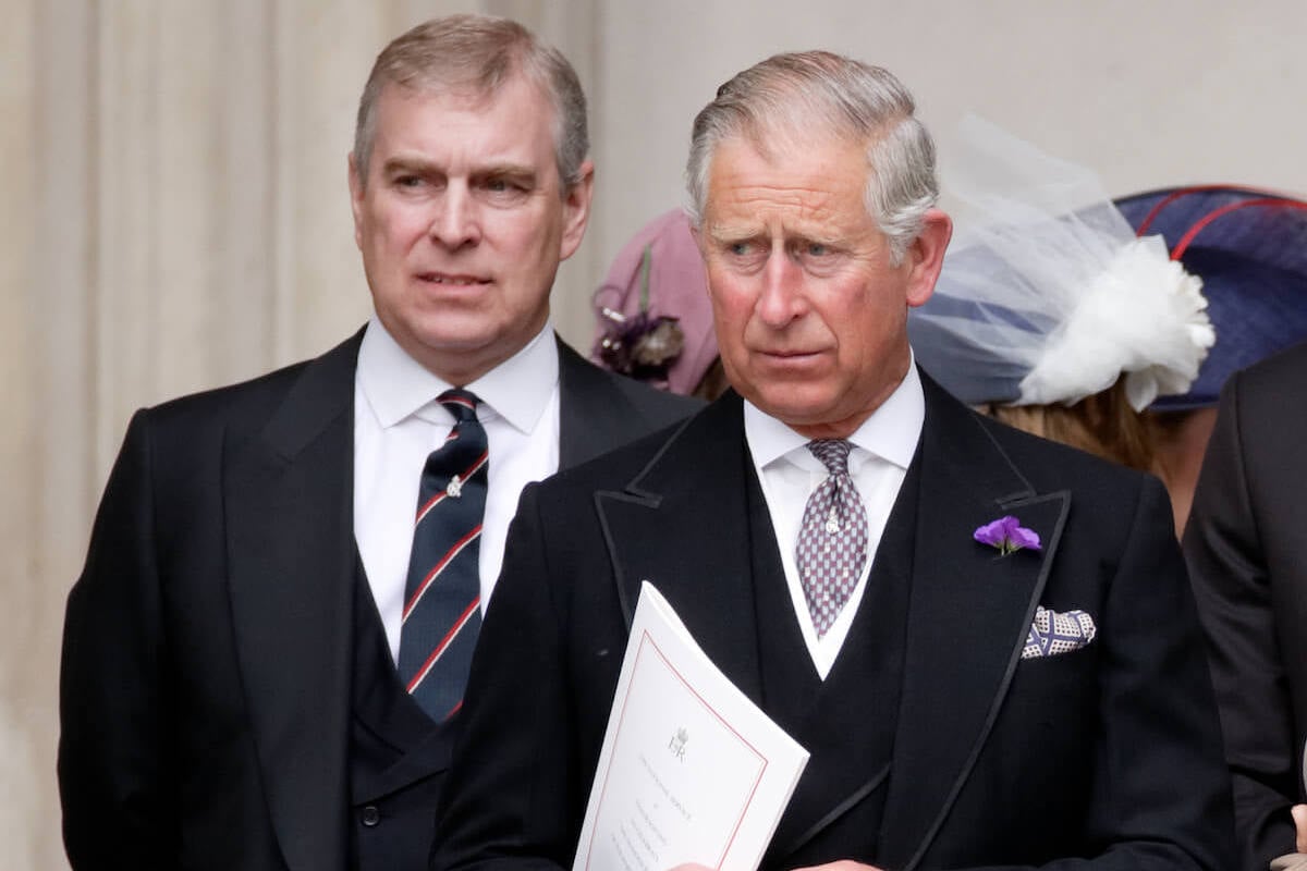 Prince Andrew and King Charles III, whose dispute about the Royal Lodge reportedly involves Princess Beatrice and Princess Eugenie, look on
