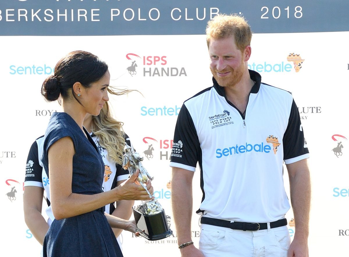 Prince Harry and Meghan Markle, who wasn't supposed to be on stage with her husband at another polo match, attend the Sentebale ISPS Handa Polo Cup