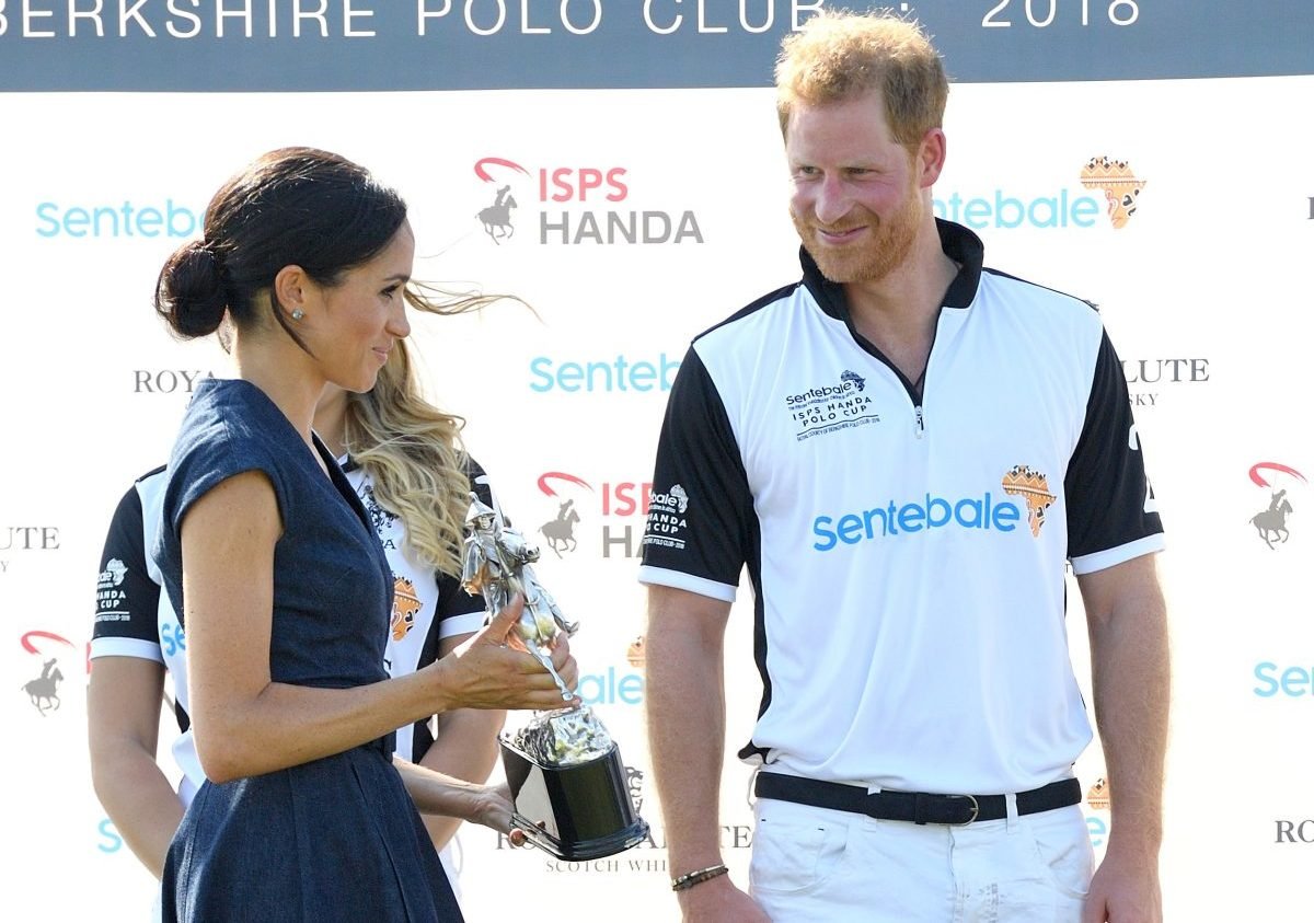 Prince Harry and Meghan Markle, who wasn't supposed to be on stage with her husband at another polo match, attend the Sentebale ISPS Handa Polo Cup