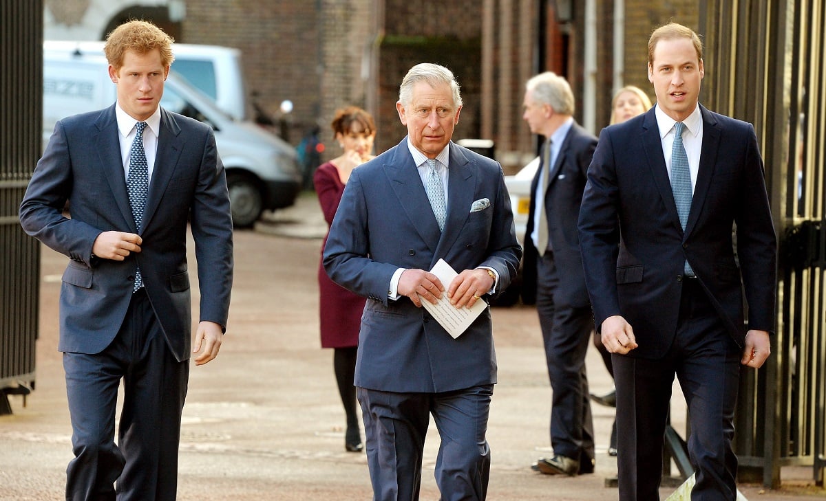 Prince Harry and Prince William with King Charles III, whose former butler is revealing what he's really like as a father, arrive at the Illegal Wildlife Trade Conference at Lancaster House