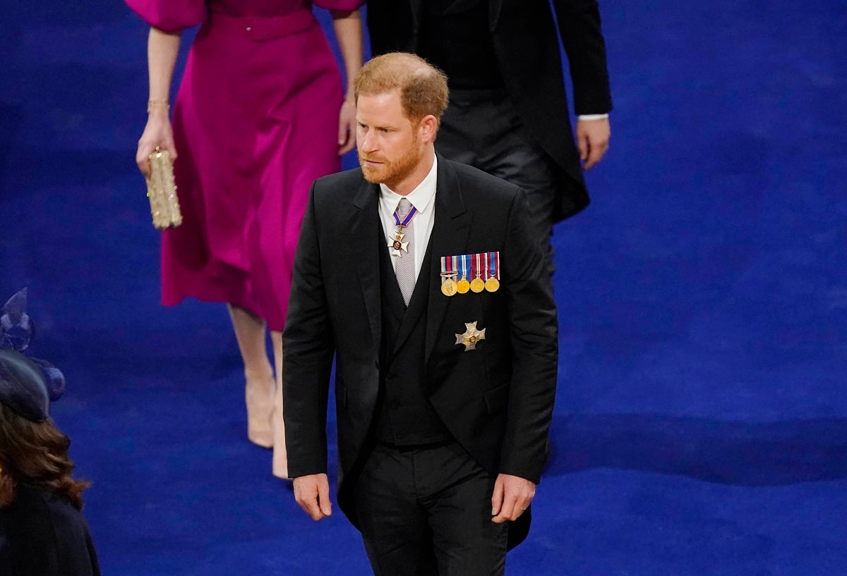 Prince Harry arriving alone at Westminster Abbey for King Charles' coronation