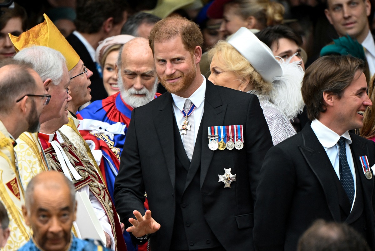 Prince Harry, who a commentator has called a 'viper' and shouldn't be invited to Trooping the Colour, leaving Westminster Abbey
