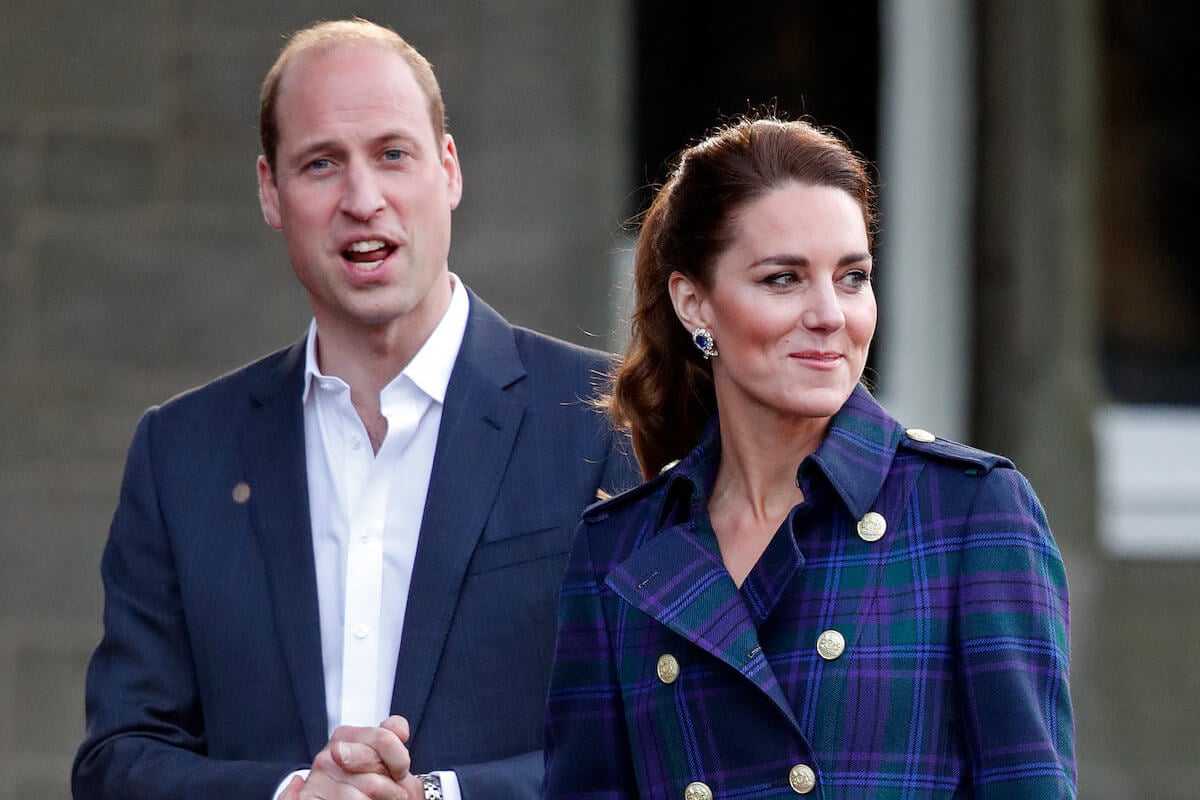 Prince William and Kate Middleton, whose signature color is 'Wales blue,' wear blue and look on
